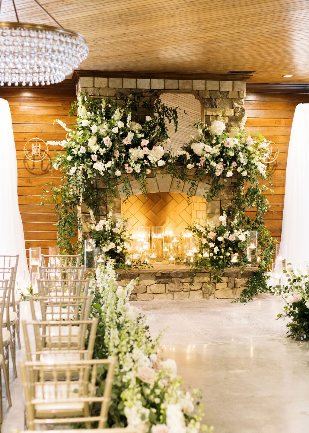 indoor florals at fireplace