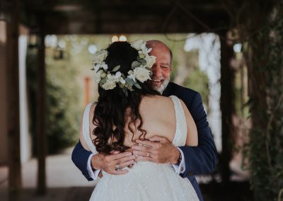bride hugging dad