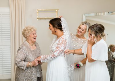 bride and family celebrating the wedding day